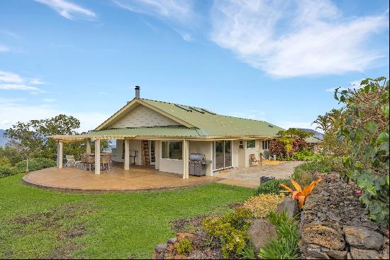 Sustainability meets functionality in this 2-acre Kula property