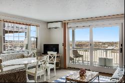 First-Floor Luxury with Gourmet Upgrades and Panoramic Cape Cod Bay Vistas