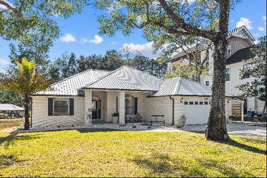 Updated Canal-Front Home With Bay Access  