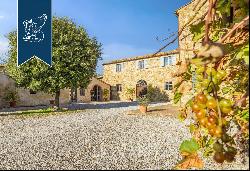 Luxurious agritourism resort with an olive grove and a view of the Crete Senesi for sale