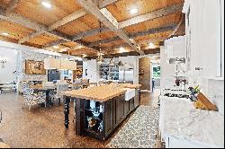 Be blown away by cathedral ceilings clad in reclaimed wood and hand-hewn beams..