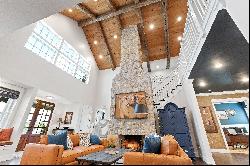 Be blown away by cathedral ceilings clad in reclaimed wood and hand-hewn beams..