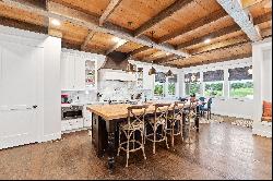 Be blown away by cathedral ceilings clad in reclaimed wood and hand-hewn beams..