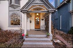 Nestled on a quiet, tree-lined street of period homes