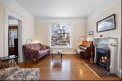 Nestled on a quiet, tree-lined street of period homes