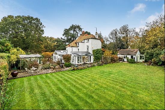 An elegant country house set on the edge of this delightful village.