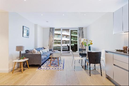 A superb two double bedroom lateral apartment with a large balcony, located in a sought-af