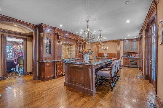 Manhasset | Presenting 183 Mill Spring Road, an exquisite brick and stone Colonial nestled