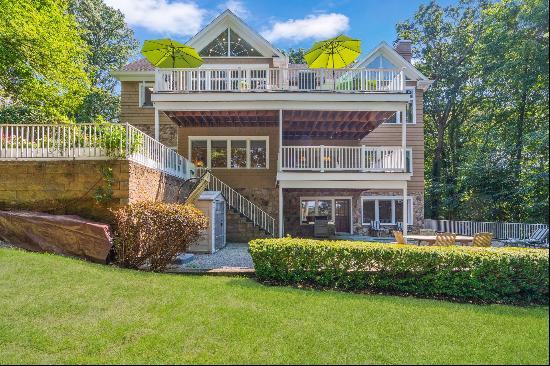 Welcome to Twin Peaks! What an incredible home. Built into a wooded hillside overlooking C