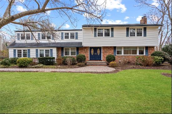 COLD SPRING HARBOR - Welcome to this luxurious 5-bedroom (+ den) 4.5 bath Colonial on half