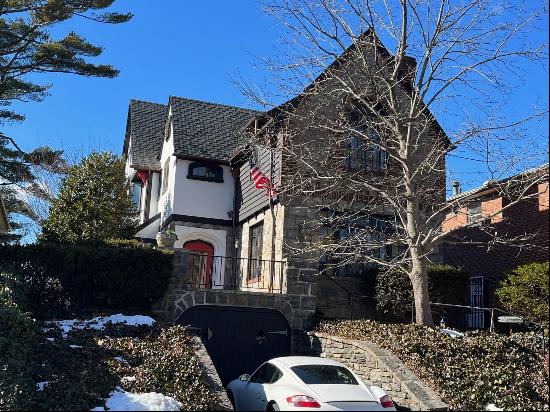 Beautiful picturesque Tudor 3 bedrooms 2.5 baths, Entry foyer, hardwood floors and woodwor