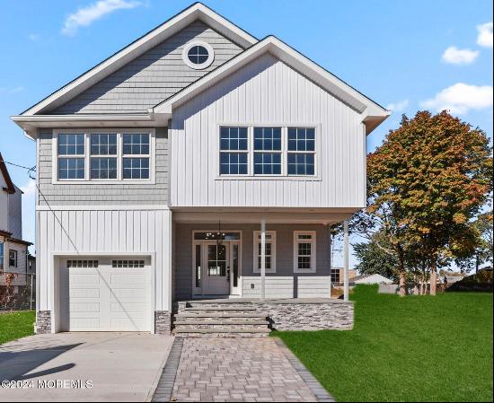 NEW CONSTRUCTION thoughtfully crafted for versatile living on the Jersey Shore. Whether th