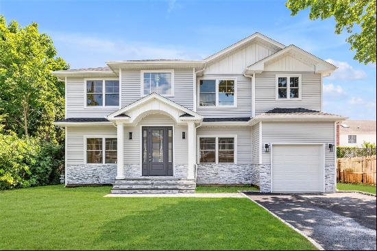 Introducing an exquisite new construction home under construction in the coveted Syosset G