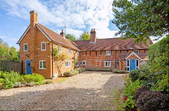 Charming Grade II listed character home with appealing interior and wonderful gardens.