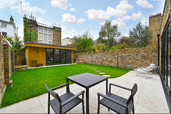 A newly refurbished lateral garden apartment (1,395 sq ft / 129.6 sq m) with a private rea