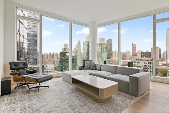 Experience NYC living at its finest in this magnificent, pristine FULLY FURNISHED corne