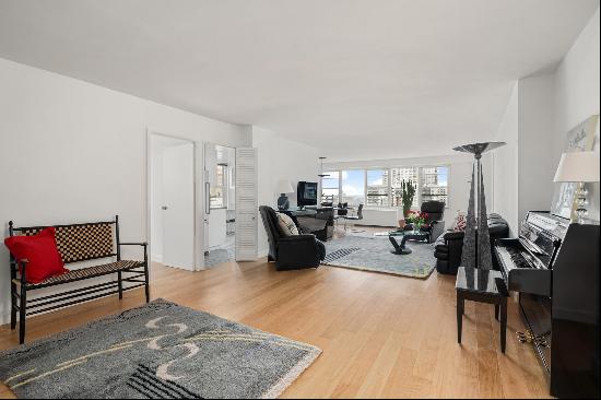   This sun-filled combination home in the coveted building at 370 East 76th Street i