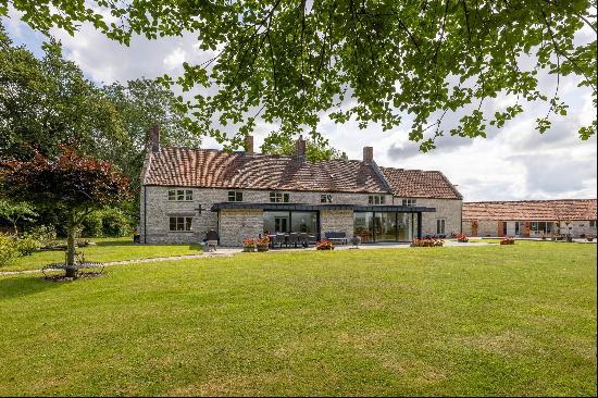 A beautifully presented 17th century Somerset farmhouse set in just under four acres with 