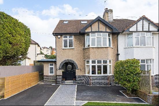 An immaculately presented and extended family home with four bedrooms arranged over three 