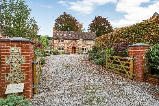 A detached family home located in the village of Amport with picturesque countryside views