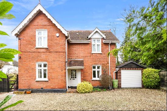 A charming detached Victorian home situated in the leafy district of Pittville on the nort