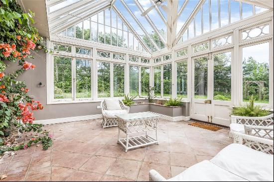 A five bedroom, period family home ideally positioned in this prestigious private road.