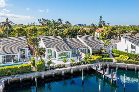 Meticulously updated, this Ocean Ridge townhouse villa is located in the gated waterfront 