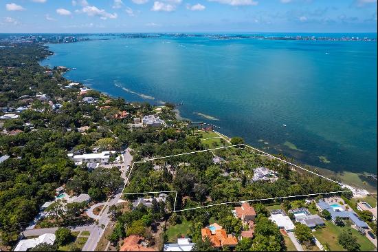 This exquisite waterfront parcel, spanning nearly 5 acres and more than 400 ft on the open