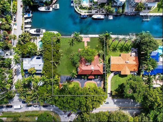 Seize this rare opportunity to own a premier waterfront estate in the heart of Coconut Gro