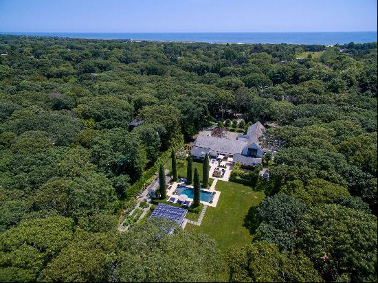 Explore this elegant Amagansett modern retreat, south of the highway, boasting refined int