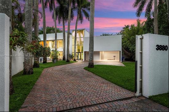 As you step into this fully enclosed and gated modern estate in the prestigious South Grov