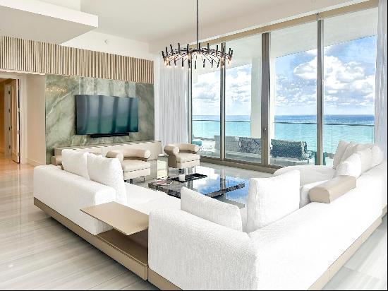 Step Inside With Me! This oceanfront corner residence at the award-winning Estates at Acqu