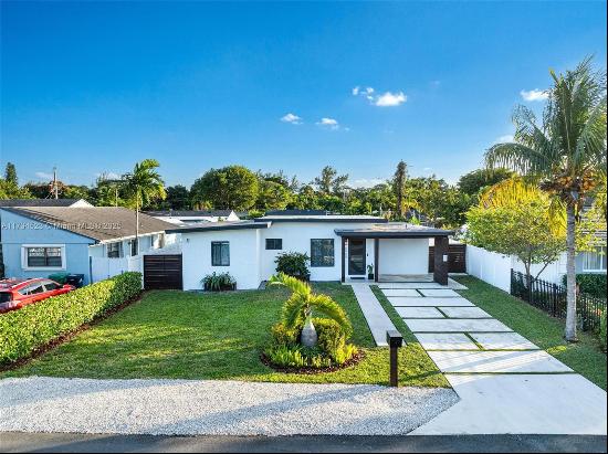 Nestled in one of Miamis fastest-growing neighborhoods, this stunning home has been comple