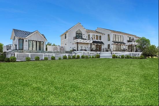 Welcome to 102 Dune Road, a uniquely designed 6,000 Square foot home, nestled in the heart