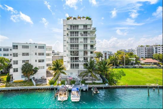 Experience the epitome of waterfront luxury in this stunning 3-bedroom, 3.5-bath corner re