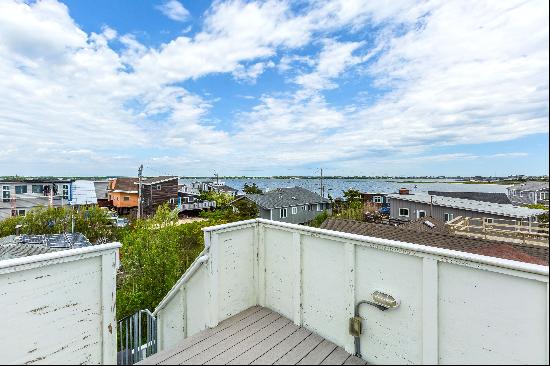 Summer is calling from this very affordable, clean and up to date two bedroom beach house.