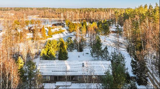 A cozy homestead surrounded by forest