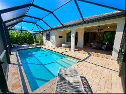 6906 Winding Cypress Dr, Naples FL 34114