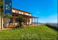 Villa with outbuilding and big park for sale in the heart of the Tuscan hills