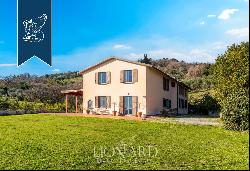 Villa with outbuilding and big park for sale in the heart of the Tuscan hills