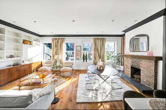 Discover an exquisite four-bedroom penthouse nestled in one of the city's most vibrant 