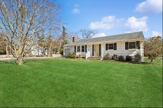 Welcome to 6 Bishop Place, a beautifully updated residence in the heart of Westhampton Bea