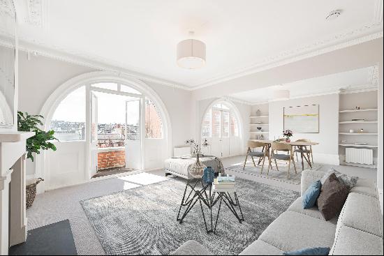 A charming 3 bedroom apartment to rent in Kensington, W8.