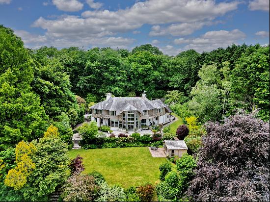 A magnificent family home with unique, luxury styling and beautiful countryside views.