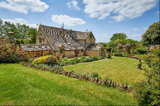 A wonderful edge of village home with mature gardens and ancillary accommodation