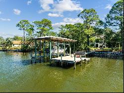 Exceptional Boater's Estate With Custom Home, Waterfront Lots, A Dock And More