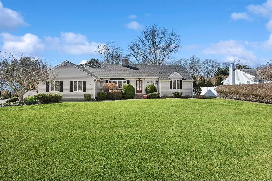 Introducing a beautifully maintained ranch-style beach house from circa 1950s, featuring p