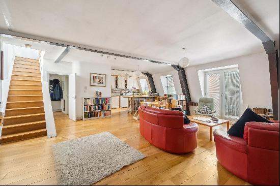 A unique one-bedroom apartment on the top floor of a warehouse conversion.