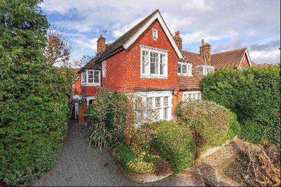 An elegant four bedroom semi-detached family home for sale on Vineyard Hill Road in Wimble