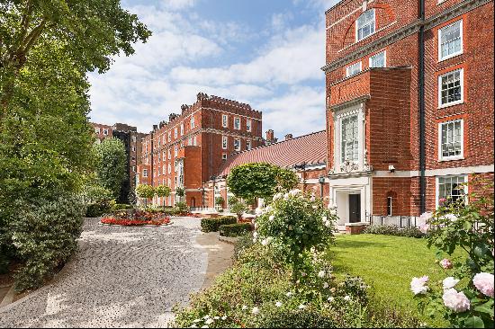 An impressive three-bedroom lateral apartment in one of London's most sought-after develop